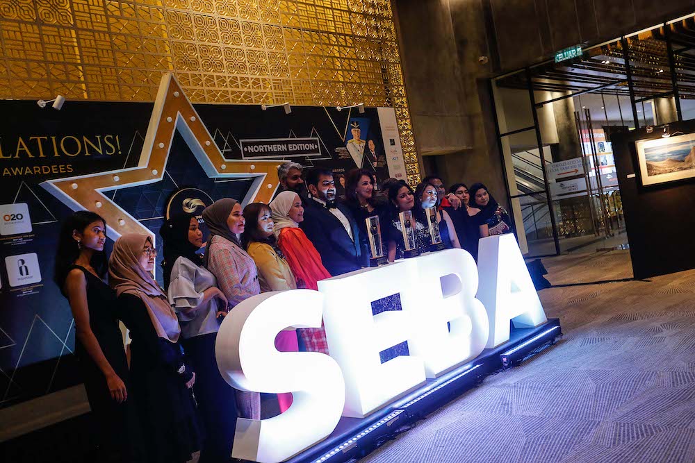 Winners of the 2022 SME and Entrepreneur Business Award have their picture taken the at SPICE Convention Centre in Penang March 26, 2022. Picture by Sayuti Zainudin