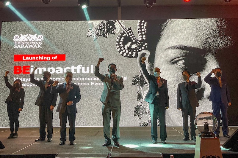 Sarawak Tourism, Creative Industry and Performing Arts Minister Datuk Sri Abdul Karim Rahman (middle) at the launching of BEimpactful at the BESarawak Tribal Gathering. u00e2u20acu201d Picture by Hari Anggara