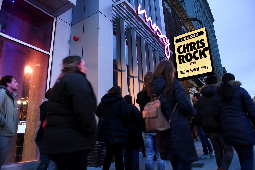 Fans gather outside the Wilbur Theater ahead of a performance by actor and comedian Chris Rock, his first performance since being hit by Will Smith at the Oscars, in Boston, Massachusetts March 30, 2022. u00e2u20acu2022 Reuters pic