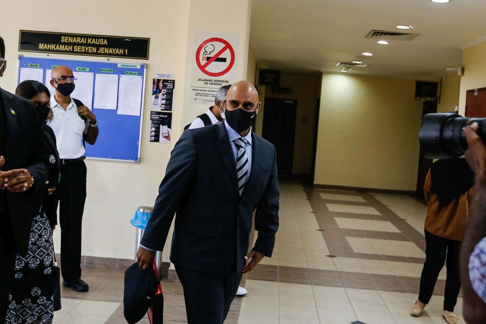 Gregory Steven Jenkins, son of the late Annapuranee Jenkins, is pictured at the George Town Sessions Court March 28, 2022. u00e2u20acu201d Picture Sayuti Zainudin