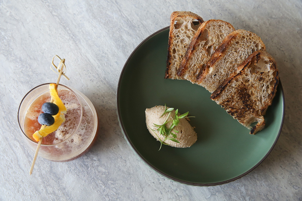 Mabel by Cookhouse's onion mousse served with toast is simply addictive with its sweet flavour and creamy texture.