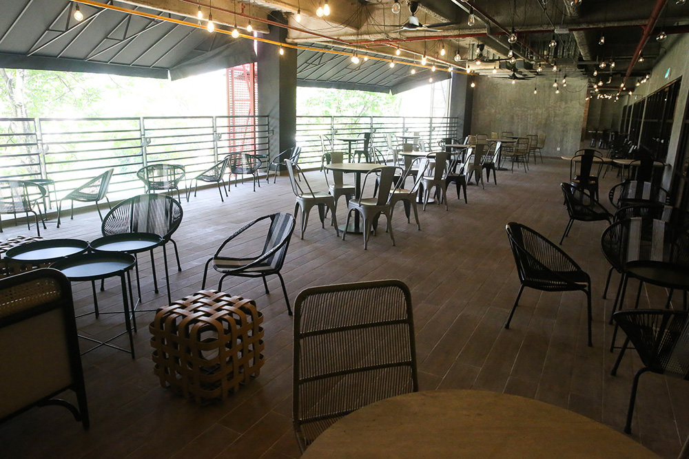If you prefer an open air space to kick back, there's a lovely spot behind that offers views of the river as you enjoy your coffee.