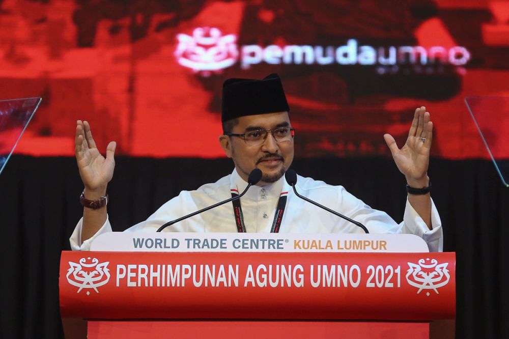 Datuk Asyraf Wajdi Dusuki delivers his speech at the opening ceremony of the 2021 Umno General Assembly for the Youth wing in Kuala Lumpur March 17, 2022. u00e2u20acu201d Picture by Yusof Mat Isa