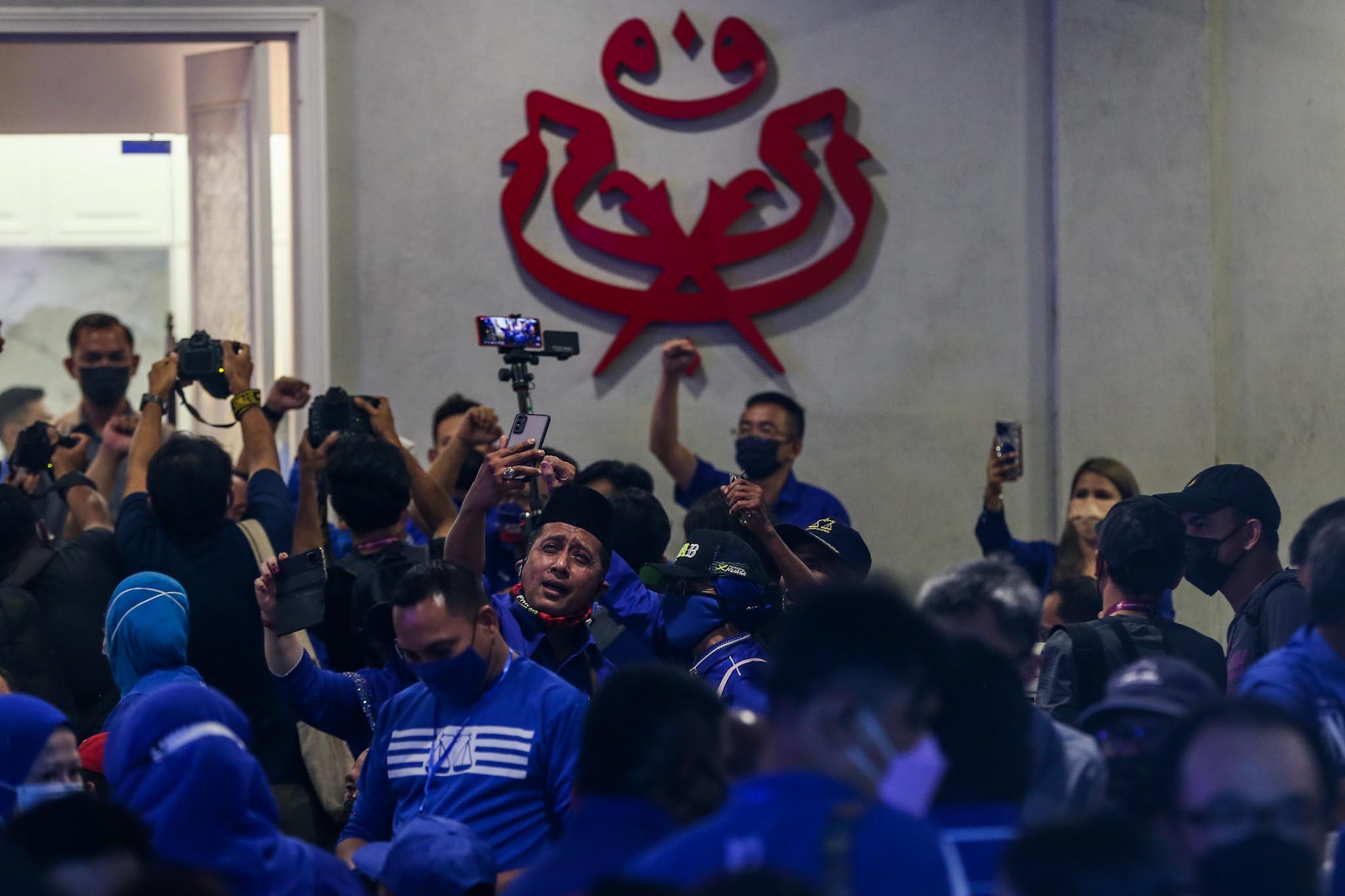 Barisan Nasional supporters are pictured at the coalitionu00e2u20acu2122s command centre at the Johor Umno Liaison Hall in Johor Baru March 12, 2022. u00e2u20acu201d Picture by Hari Anggara