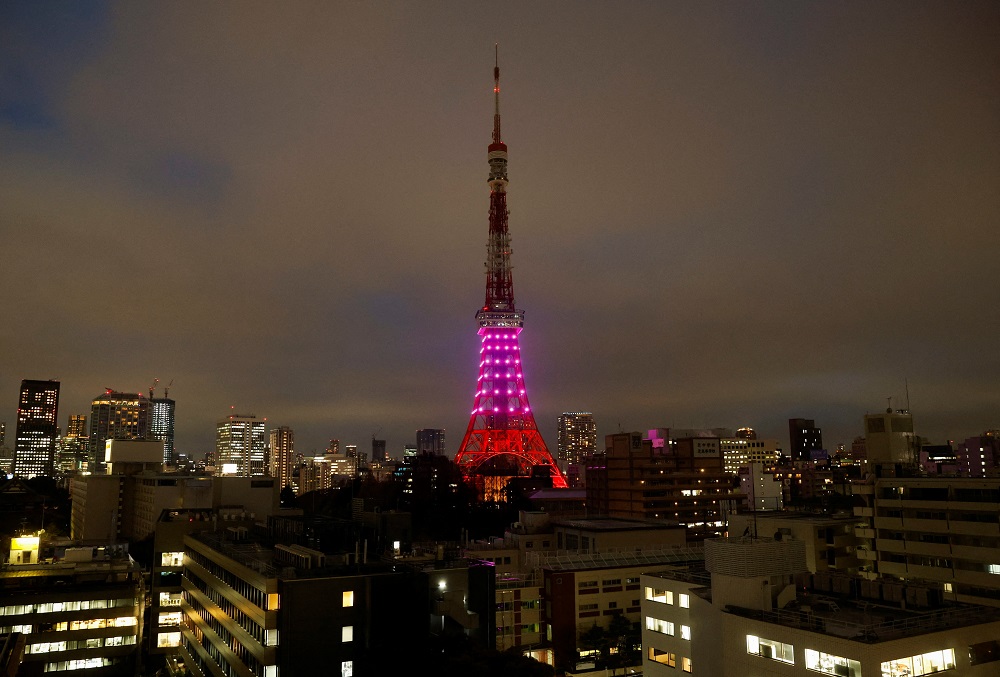 Tokyo Tower is illuminated only in the lower-half part in response to the government's request to save electricity in Tokyo, Japan March 22, 2022. u00e2u20acu2022 Reuters pic