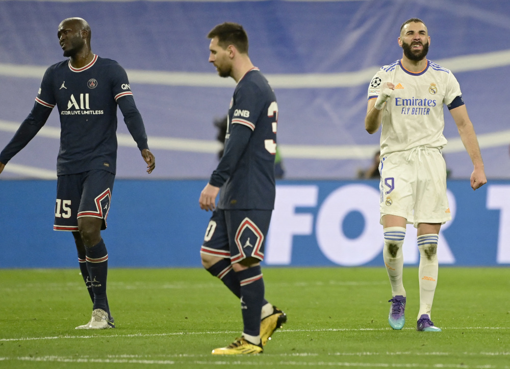 Real Madrid forward Karim Benzema celebrates after scoring a goal during the Uefa Champions League round of 16 second league match against Paris Saint-Germain at the Santiago Bernabeu stadium in Madrid, March 9, 2022. u00e2u20acu201d AFP pic 