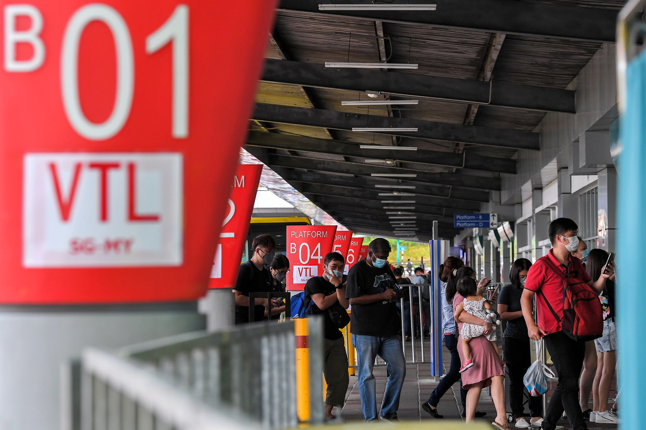 Passengers returning from Singapore arrive at the u00e2u20acu02dcVaccinated Travel Lane (VTL)u00e2u20acu2122 Special platform, many intending to fulfill their voting responsibilities in the Johor State Election, at Larkin Sentral, March 11, 2022. u00e2u20acu201d Bernama pic