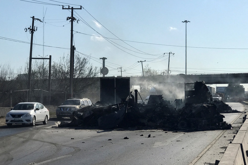The charred wreckage of a trailer, which was set ablaze by suspected gang members following the detention of one of its leaders, is pictured in Nuevo Laredo, Mexico March 14, 2022. u00e2u20acu2022 Reuters pic