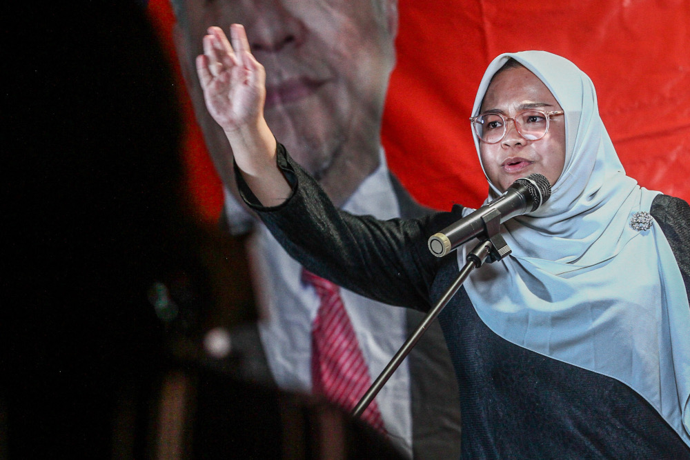 Candidate for N41 Puteri Wangsa, Amira Aisya Abd Aziz speaks at the Ceramah Mega, main operations room for DUN N49 Kota Iskandar, Skudai March 1, 2022. u00e2u20acu2022 Picture by Hari Anggara
