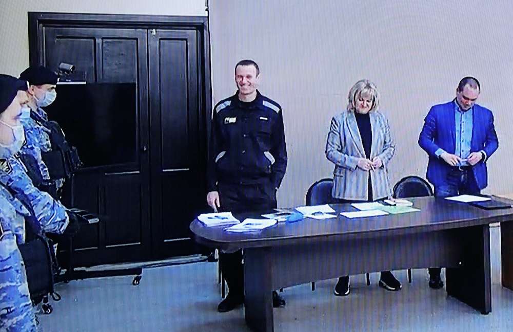Alexei Navalny, and his lawyers Olga Mikhailova and Vadim Kobzev are seen on a screen via a video link during a court hearing at the IK-2 corrective penal colony in the town of Pokrov in Vladimir Region, Russia March 22, 2022. u00e2u20acu2022 Reuters pic