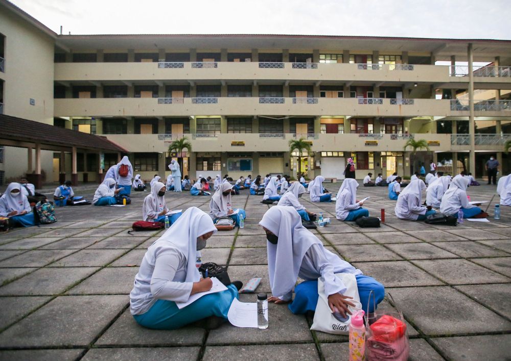 Form Five students get ready to sit for their SPM examination at SMK Tasek Damai in Ipoh March 2, 2022. — Picture by Farhan Najib