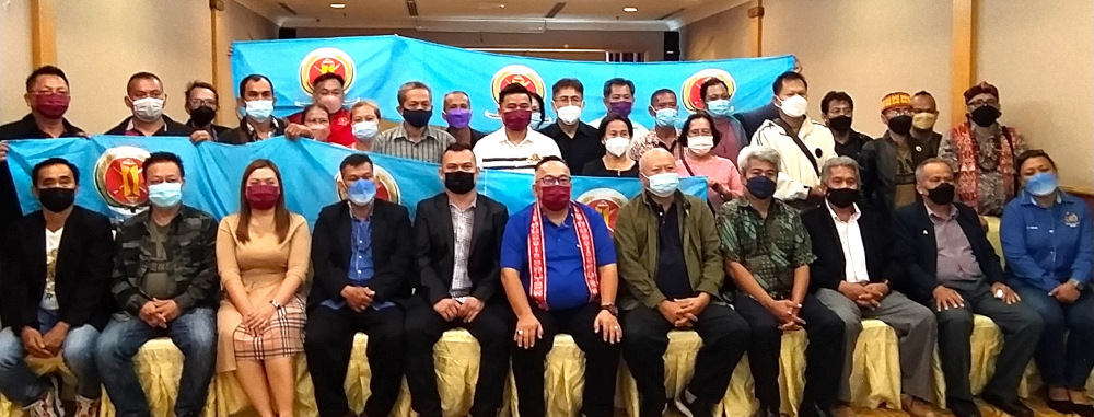 Bobby William (seated, 6th right) and PBDS new office bearers after the triennial delegates conference. u00e2u20acu201d Watt Zacchaeus/Borneo Post pic