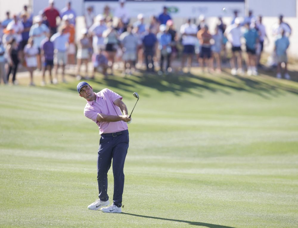 Scottie Scheffler hits his approach shot on the 13th fairway in the final round of the World Golf Championships-Dell Technologies Match Play golf tournament in Texas March 27, 2022. u00e2u20acu201d Reuters pic