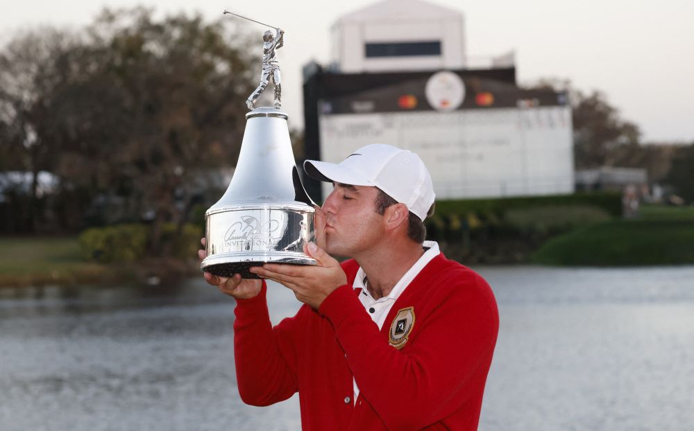 Scottie Scheffler is awarded the championship trophy after winning the Arnold Palmer Invitational golf tournament in Florida March 6, 2022. u00e2u20acu201d Reuters pic