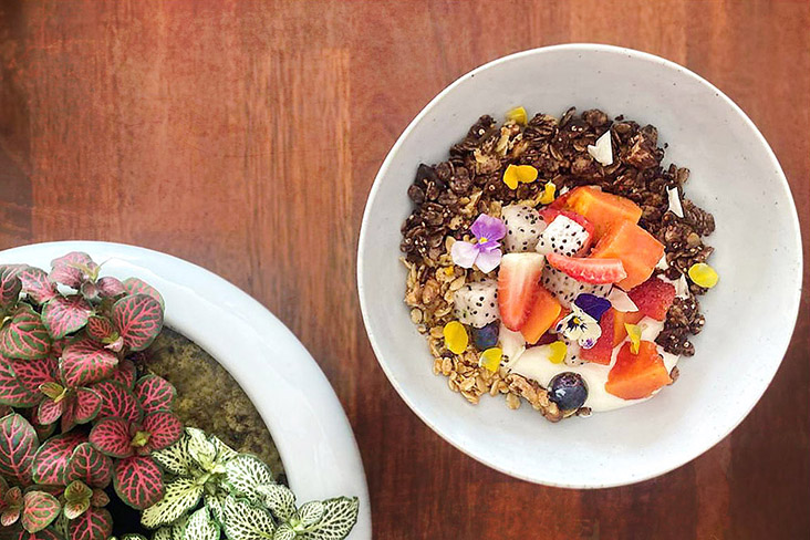 Double goodness: A bowl of house-made browned butter orange zest and double dark chocolate quinoa granola.