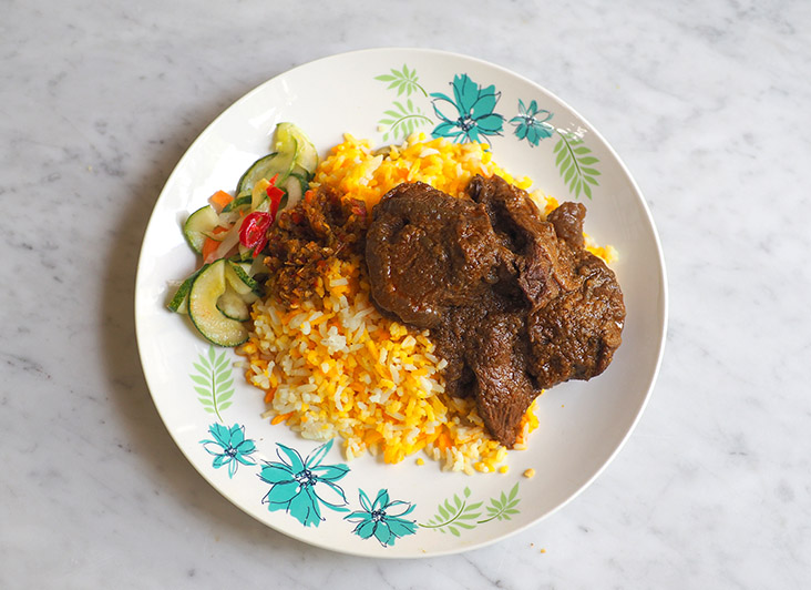 Tuck into tender ‘daging kerutuk’ with your ‘nasi minyak’