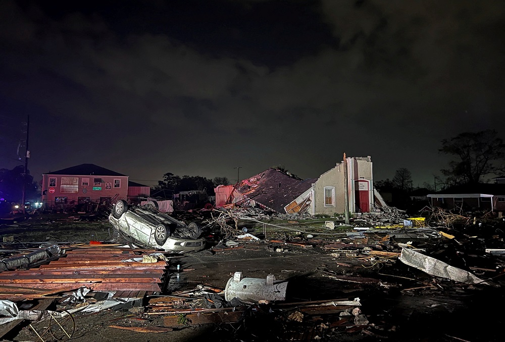 A car lies overturned among debris in the Arabi neighbourhood after a large tornado struck New Orleans, Louisiana March 22, 2022. u00e2u20acu2022 Reuters pic
