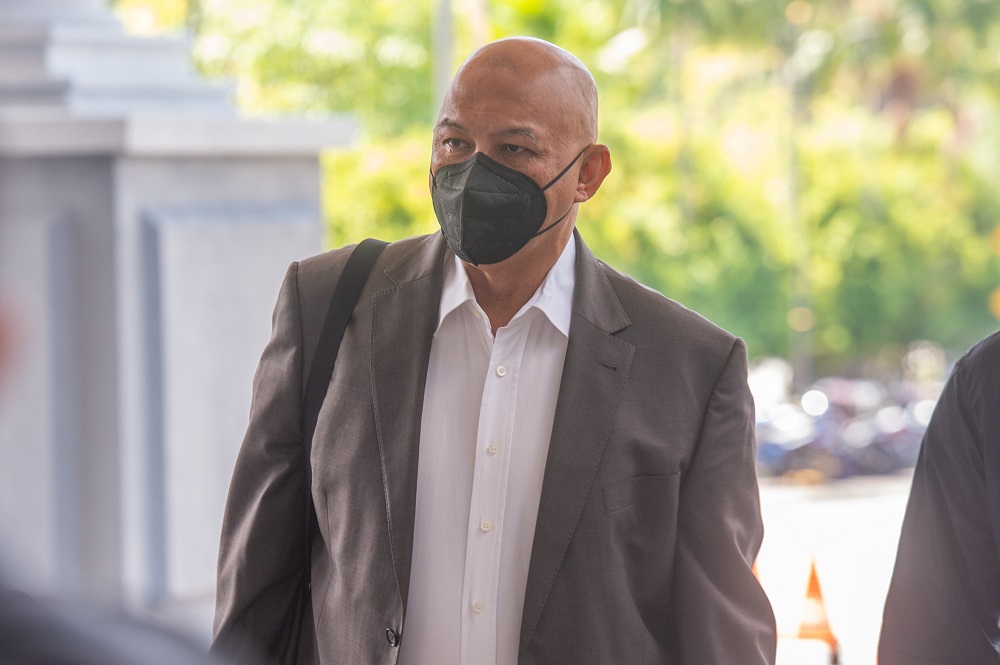 Consortium Zenith BUCG Sdn Bhd director Datuk Zarul Ahmad Mohd Zulkifli arrives at the Kuala Lumpur High Court March 24, 2022. ― Picture by Shafwan Zaidon