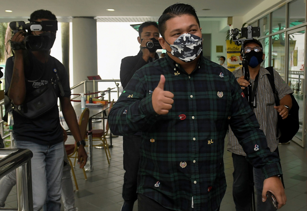 Zaidi Kanapiah, otherwise known as u00e2u20acu02dcDatuk Addy Kanau00e2u20acu2122 (2nd right), at the Shah Alam Sessions Court, March 8, 2022. u00e2u20acu201d Bernama pic 