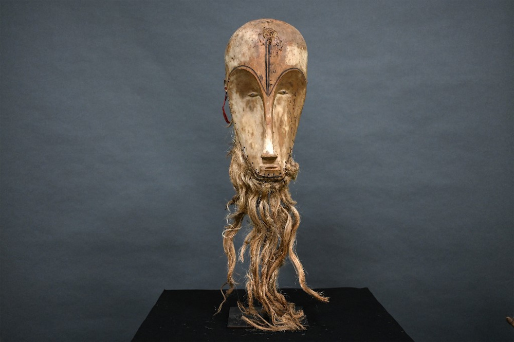This photograph taken on March 24, 2022 shows a u00e2u20acu02dcNgilu00e2u20acu2122 mask of the Fang people of Gabon on display on March 26, 2022 at the Montpellier auction house. u00e2u20acu201d AFP pic