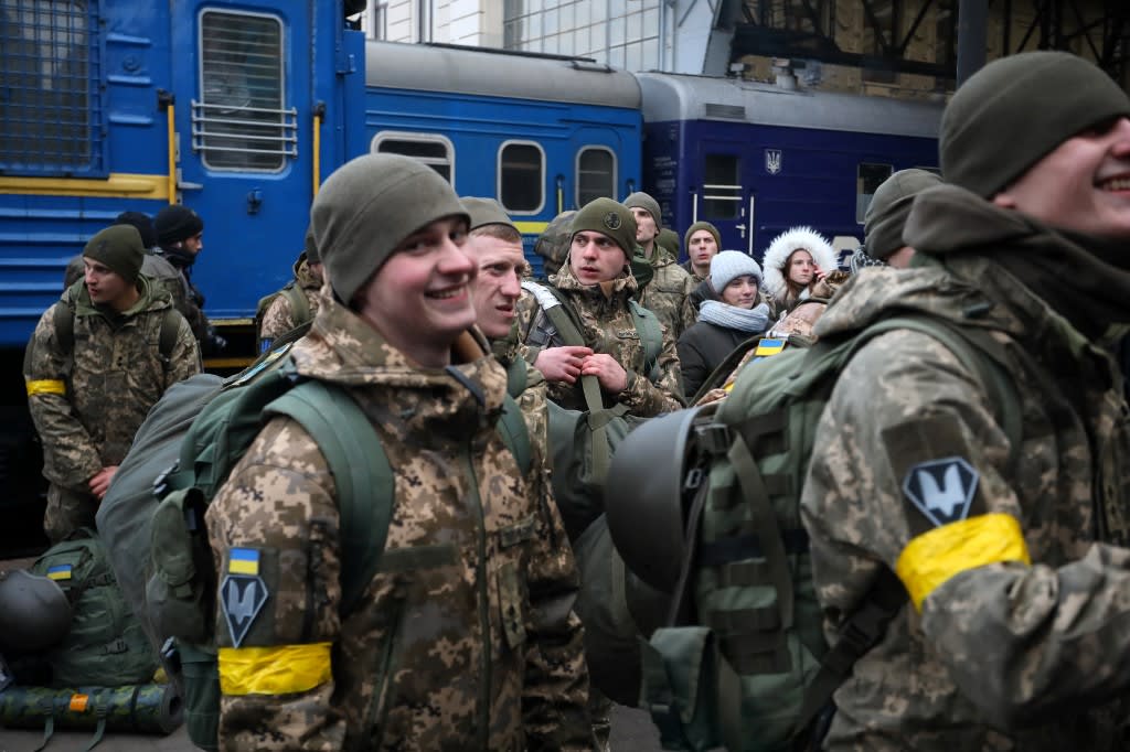 Ukrainian servicemen boarding a train in the western Ukrainian city of Lviv as they depart in the direction of the country's capital Kyiv on March 9, 2022, amid the ongoing Russia's invasion of Ukraine. u00e2u20acu2022 AFP pic