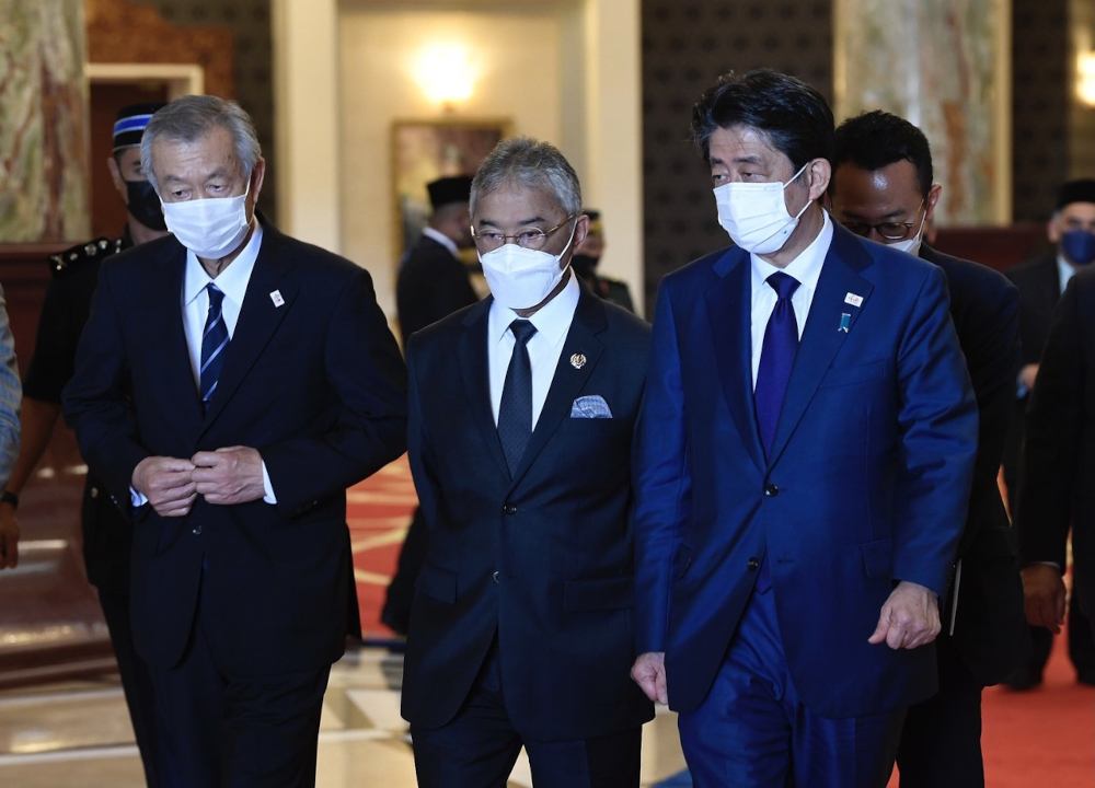 The King with former Japanese Prime Minister Shinzo Abe (right) at Istana Negara, March 11, 2022. u00e2u20acu201d Bernama pic 