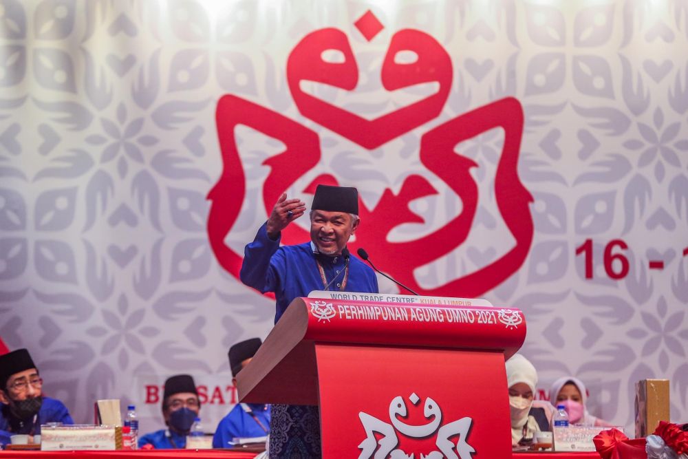 Umno president Datuk Seri Ahmad Zahid Hamidi delivers a speech at the 2021 Umno General Assembly at the World Trade Centre Kuala Lumpur March 19, 2022. u00e2u20acu201d Picture by Hari Anggara