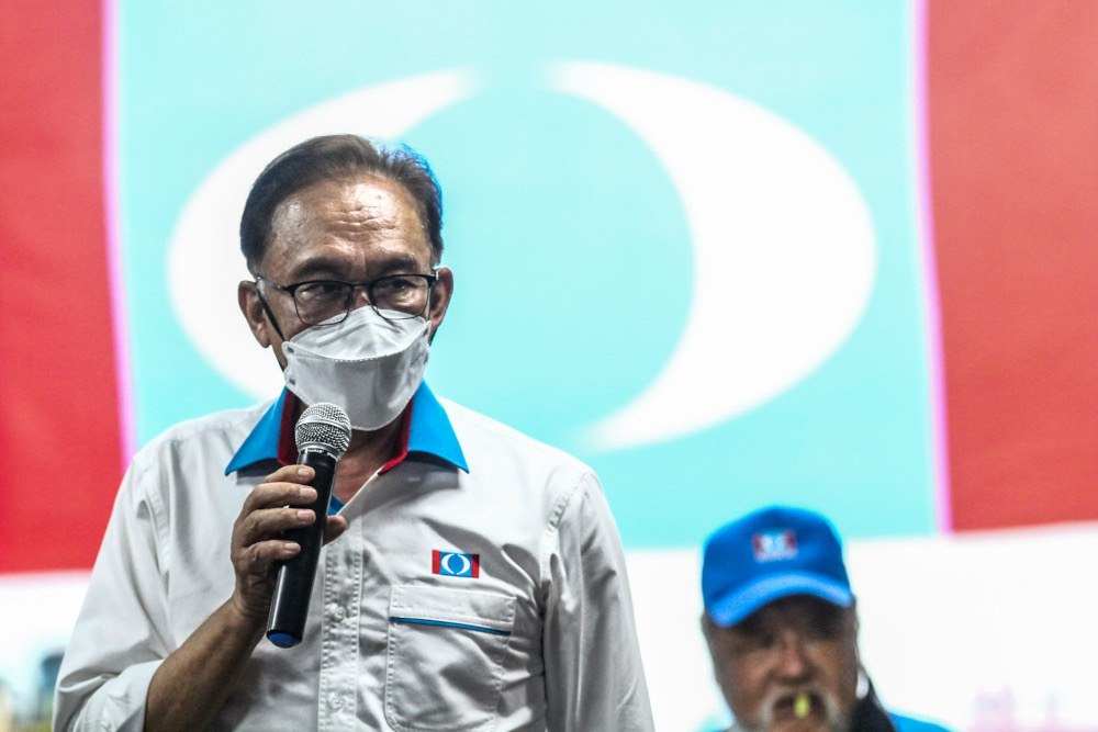 PKR president Datuk Seri Anwar Ibrahim giving his speech at the DUN N27 at the PKR Operations Room in Bandar Layang-Layang, Simpang Renggam, Johor, March 3, 2022. u00e2u20acu2022 Picture by Hari Anggara