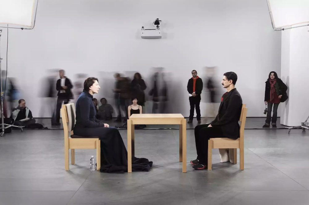 For nearly three months, eight hours a day, Marina Abramoviu00c4u2021 met the gaze of more than 1,500 strangers as part of u00e2u20acu02dcThe Artist is Present.u00e2u20acu2122 u00e2u20acu201d Picture courtesy of Artsy via ETX Studio