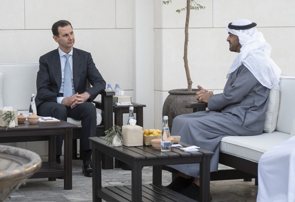 Syriau00e2u20acu2122s President Bashar al-Assad (left) meeting with the UAEu00e2u20acu2122s de facto ruler Sheikh Mohammed bin Zayed Al-Nahyan, in the capital Abu Dhabi, on March 18, 2022. u00e2u20acu201d UAE Ministry of Presidential Affairs / AFP pic