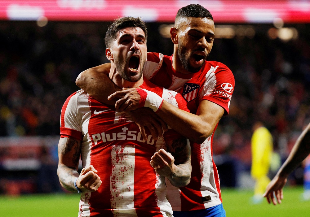 Atletico Madrid's Rodrigo De Paul celebrates with Renan Lodi after scoring the second goal against Cadiz March 12, 2022. u00e2u20acu2022 Reuters pic
