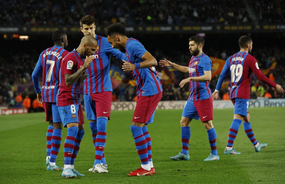 FC Barcelona's Pierre-Emerick Aubameyang celebrates scoring their third goal against Osasuna with Dani Alves and Gerard Pique at Camp Nou, Barcelona March 13, 2022. u00e2u20acu201d Reuters pic
