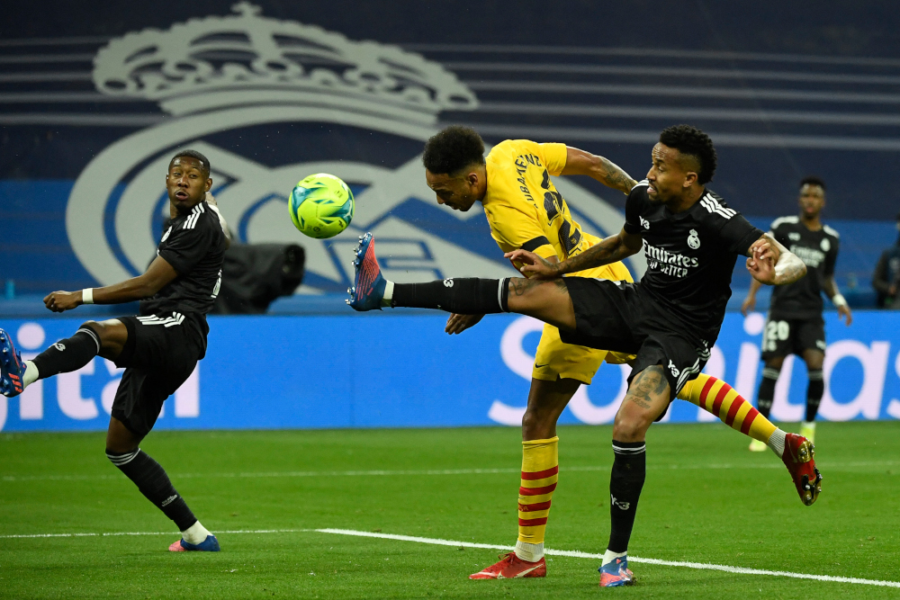 Barcelona midfielder Pierre-Emerick Aubameyang scores a goal during the Spanish League match against Real Madrid CF at the Santiago Bernabeu stadium in Madrid, March 20, 2022. u00e2u20acu2022 AFP picnn