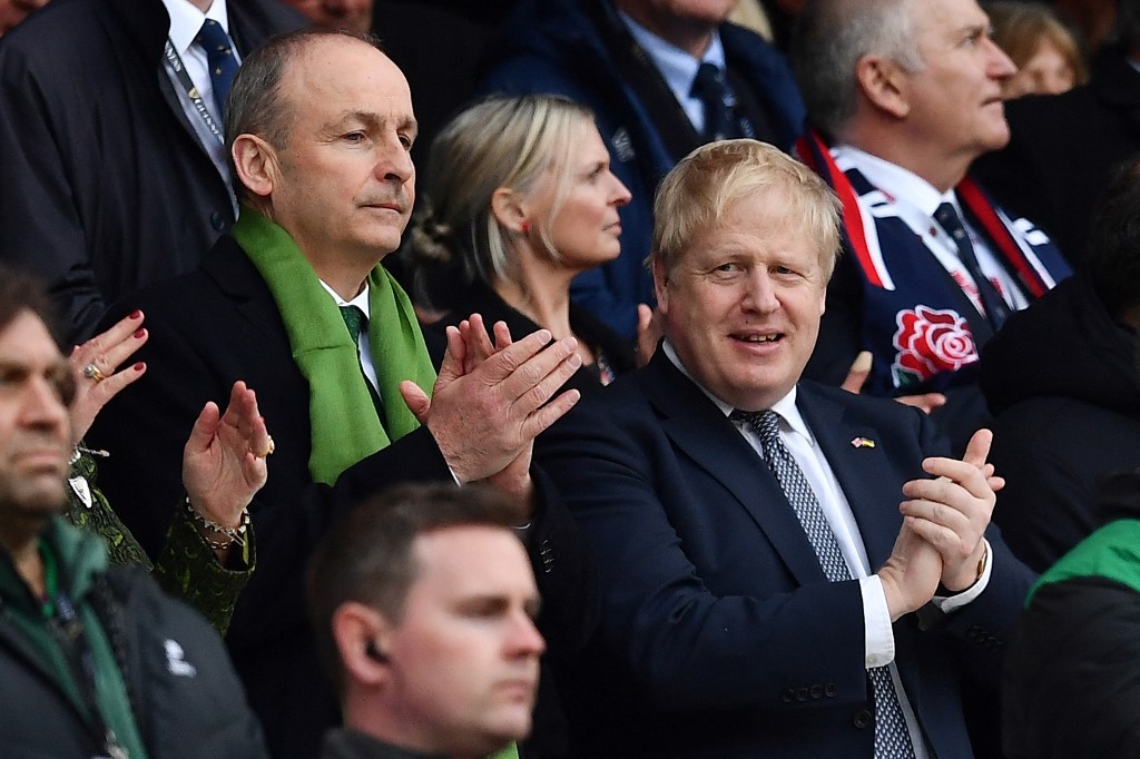 Britainu00e2u20acu2122s Prime Minister Boris Johnson (right) and Irelandu00e2u20acu2122s Prime Minister Micheal Martin wait for the start of the Six Nations international rugby union match between England and Ireland at Twickenham Stadium, London, March 12, 2022. u00e2u20acu201d AFP pic
