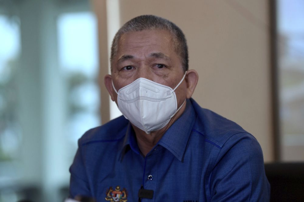 Works Minister Datuk Seri Fadillah Yusof speaks to reporters after inspecting FT252 Jalan Gunung Jerai slope repair works in Gurun March 19, 2022. u00e2u20acu201d Bernama pic