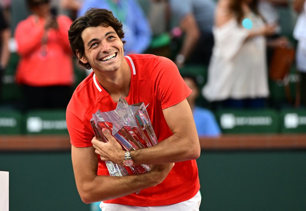 Taylor Fritz holds the championship trophy after defeating Rafael Nadal in the menu00e2u20acu2122s final at the Indian Wells Tennis Garden March 20, 2022. u00e2u20acu201d Reuters pic