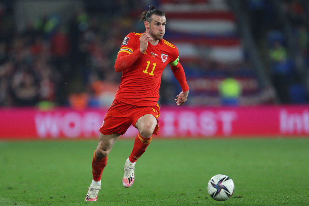 Walesu00e2u20acu2122 midfielder Gareth Bale runs with the ball during the Fifa World Cup 2022 play-off semi-final qualifier match between Wales and Austria at Cardiff City Stadium in Cardiff, south Wales, March 24, 2022. u00e2u20acu201d AFP pic 