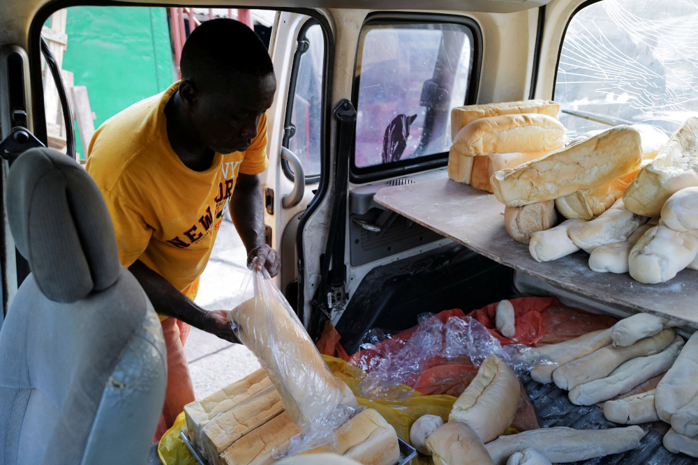 David Eshun 45, co-owner of Bethel Brothers bakery, prepares to deliver baked bread from the Bethel Brothers bakery to customers in Accra, Ghana, March 8, 2022. — Reuters pic 