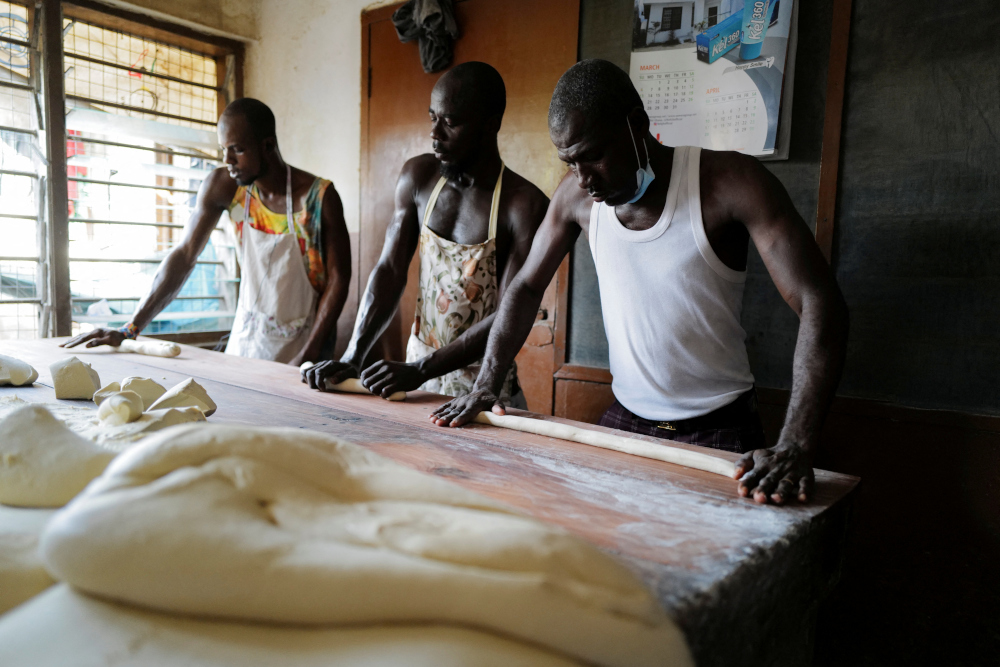 Bakers prepare rolls of bread dough at the Bethel Brothers bakery in Accra, Ghana, March 6, 2022. u00e2u20acu201d Reuters pic 