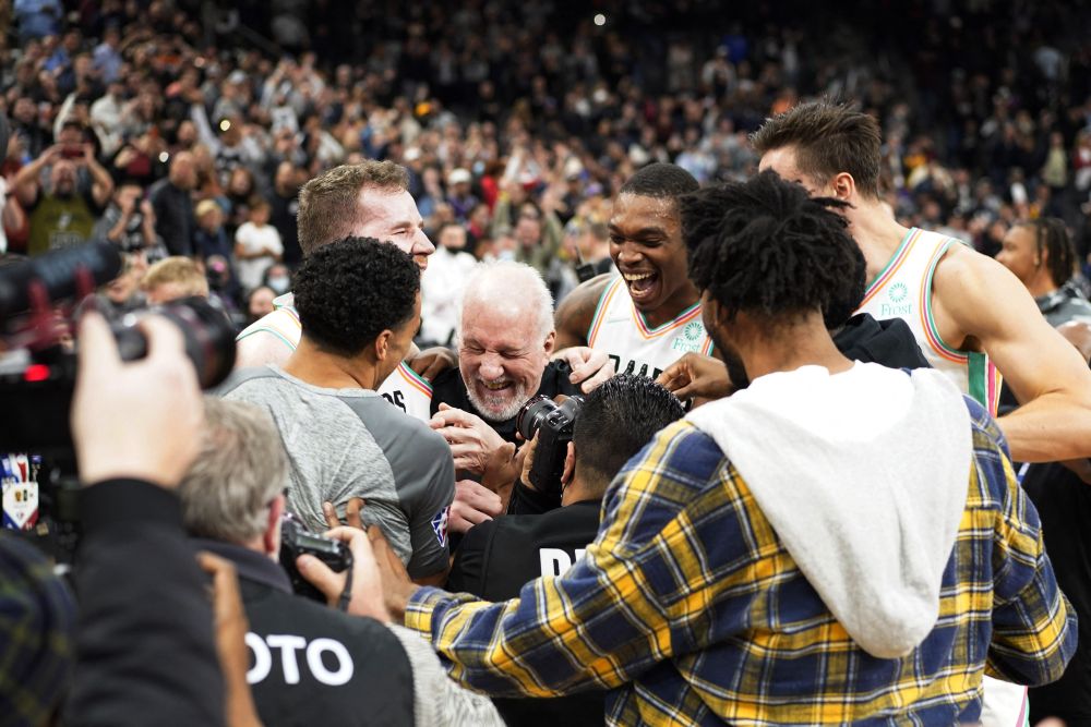 San Antonio Spurs head coach Gregg Popovich is congratulated by players after becoming the coach with the most wins in NBA history after the game against the Utah Jazz in San Antonio March 11, 2022.u00e2u20acu2022 Reuters pic