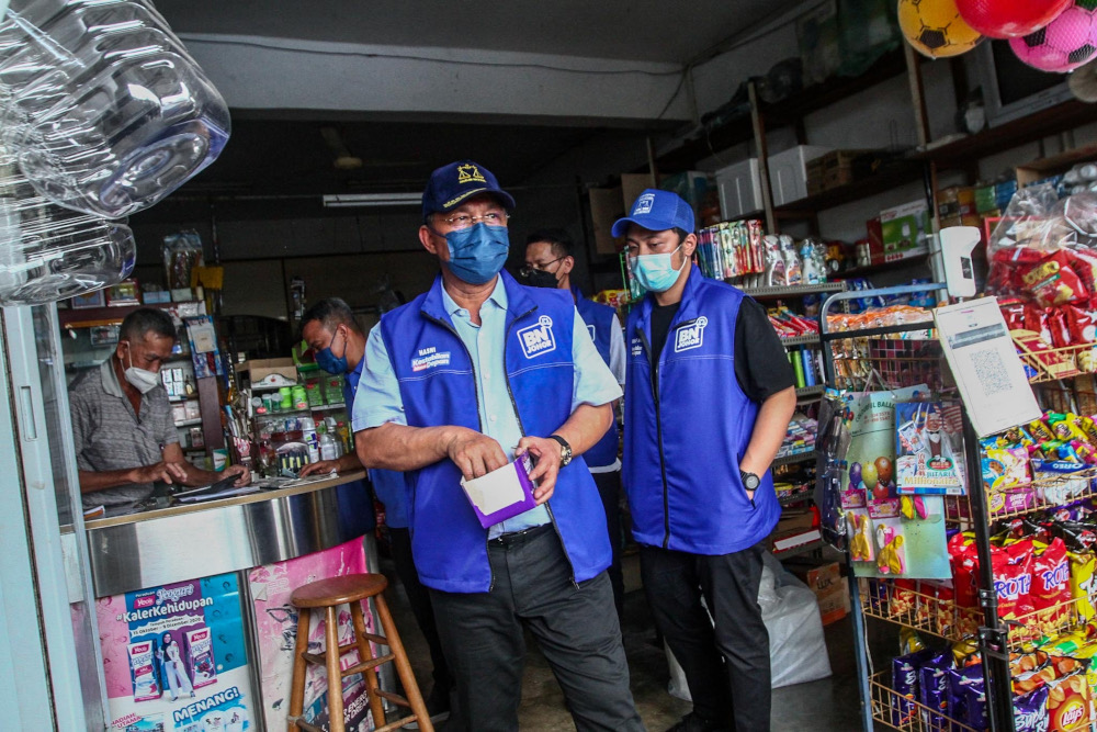 Candidate N53 Benut, Datuk Hasni Mohammad during a walkabout session in conjunction with the 15th Johor state election in Kampung Parit Bertak, Benut, March 8, 2022. u00e2u20acu201d Picture by Hari Anggara