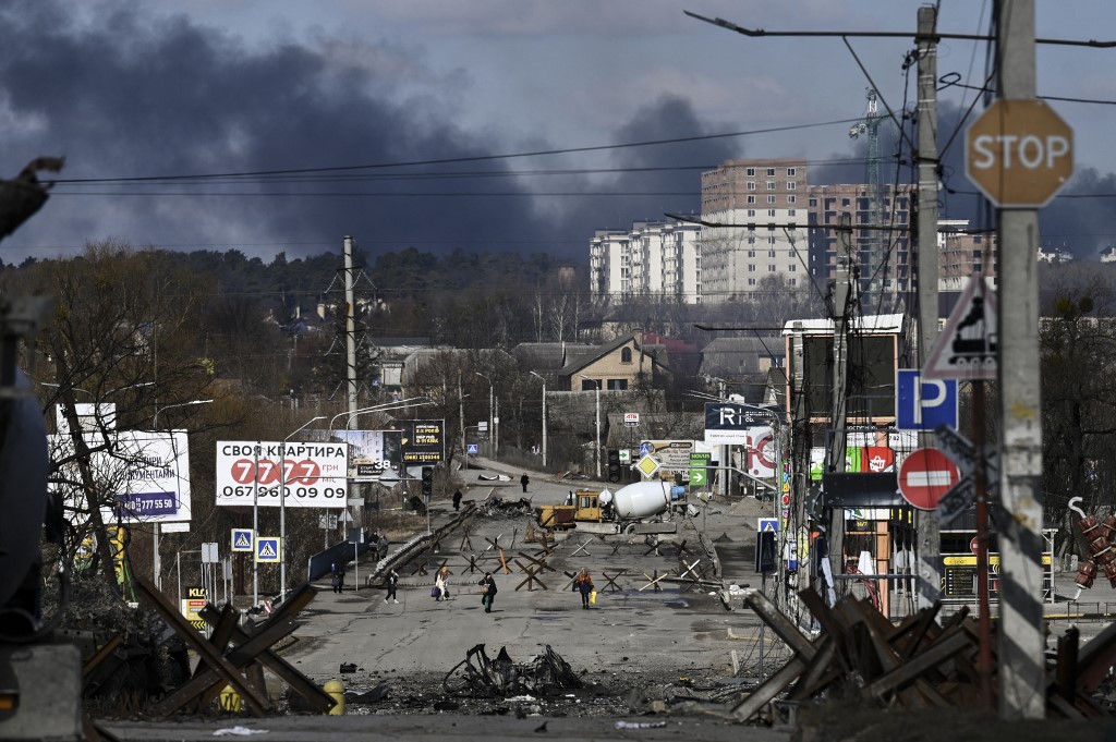 Residents evacuate the city of Irpin, north of Kyiv, on March 10, 2022. Russian forces rolled their armoured vehicles up to the northeastern edge of Kyiv, edging closer in their attempts to encircle the Ukrainian capital. u00e2u20acu201d AFP pic