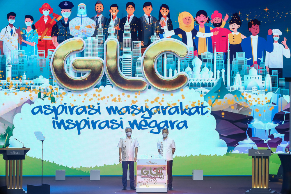Prime Minister Datuk Seri Ismail Sabri Yaakob and Finance Minister Datuk Seri Tengku Zafrul Abdul Aziz during the launch of the 2022 GLC Open Day at Kuala Lumpur Convention Centre March 11, 2022. u00e2u20acu201d Picture by Yusof Mat Isan