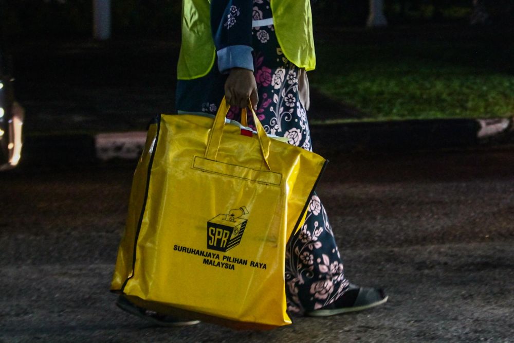 Ballot boxes arrive at official counting centre at Dewan Jubli Intan Sultan Ibrahim in Johor Baru March 12, 2022. u00e2u20acu201d Pictures by Hari Anggara