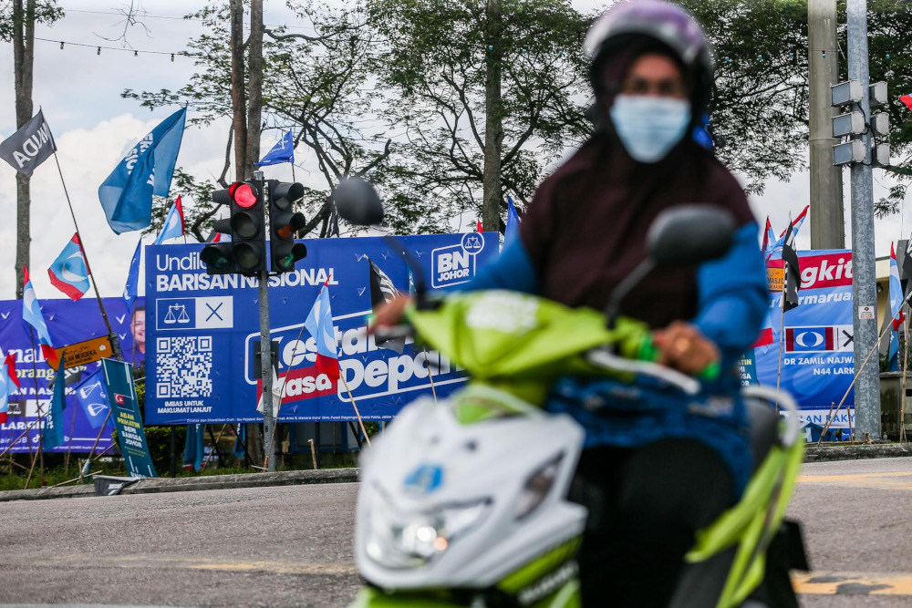 A flag war between the parties contesting in the 15th Johor state election in N44 Larkin, Johor Baru, March 9, 2022. u00e2u20acu201d Picture by Hari Anggara