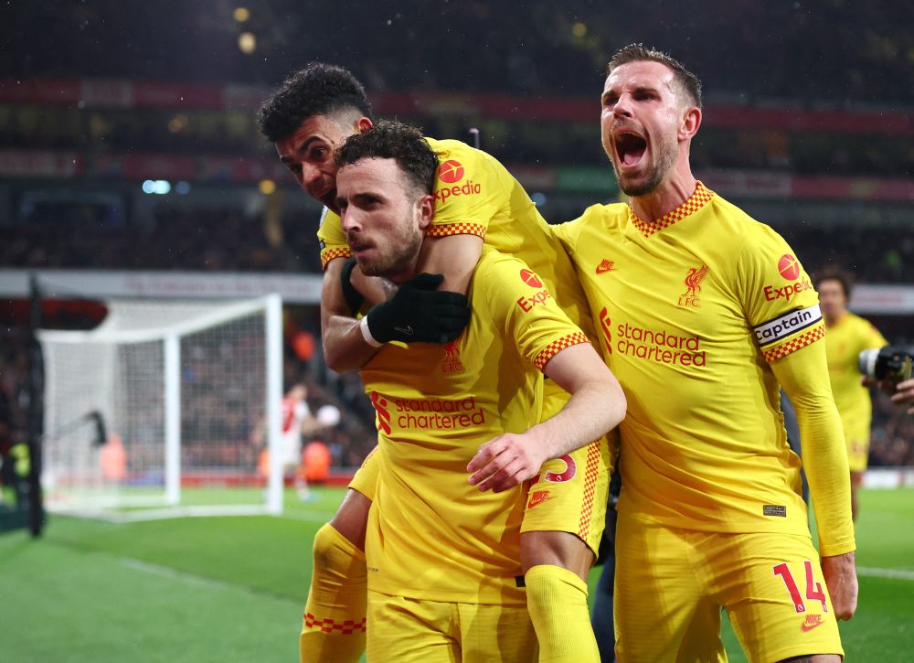 Liverpool's Diogo Jota celebrates with teammates after scoring their first goal against Arsenal at the Emirates Stadium, London March 16, 2022. u00e2u20acu201d Reuters pic