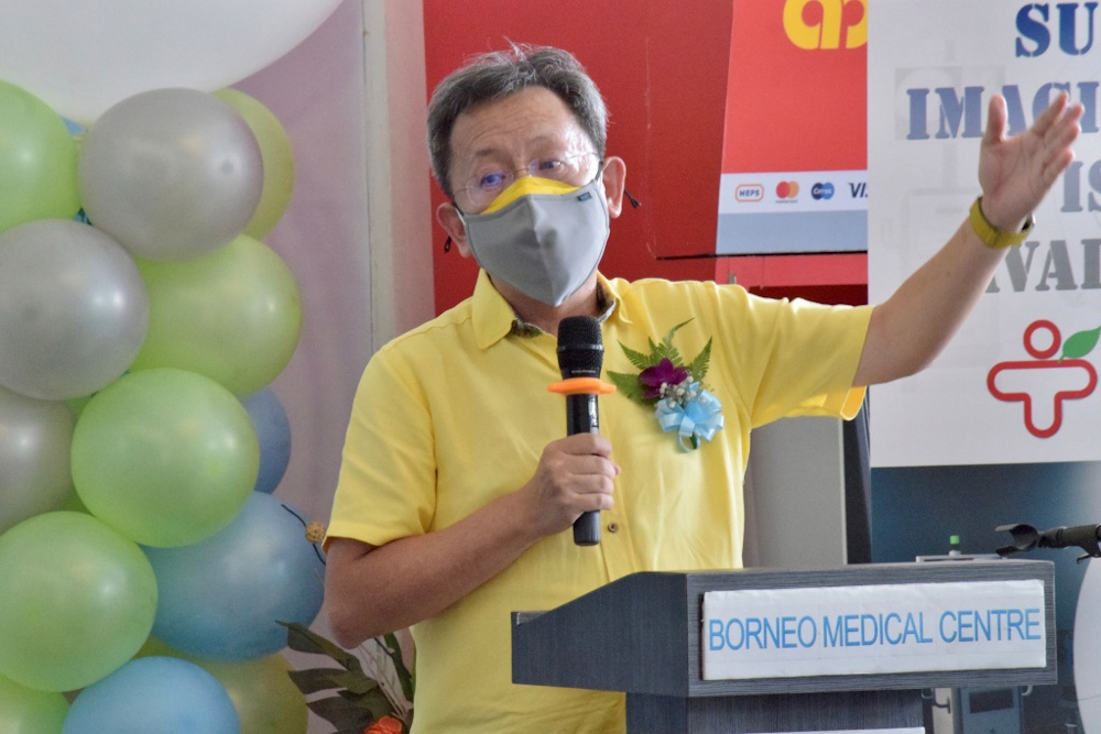 Datuk Seri Dr Sim Kui Hian delivers his speech at an event on February 27, 2022. u00e2u20acu201d Roystein Emmor/Borneo Post pic