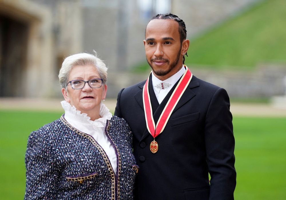Lewis Hamilton poses with his mother Carmen Lockhart for a photo during an investiture ceremony at Windsor Castle in Windsor December 15, 2021. u00e2u20acu201d Reuters pic