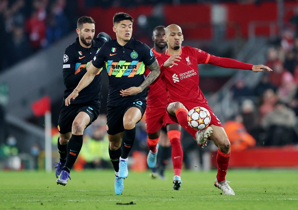 Inter Milan's Alessandro Bastoni in action with Liverpool's Fabinho during the Champions League match at Anfield, March 9, 2022. u00e2u20acu2022 Action Images via Reuters/Carl Recine
