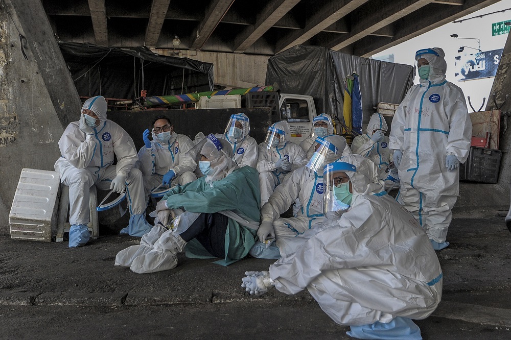 Personal Protection Equipment (PPE) became the new uniform of the medical frontliners and they wore it daily without any sigh of despair. ― Picture by Shafwan Zaidon